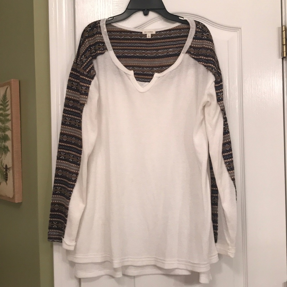 Cream top with blue/gold trim